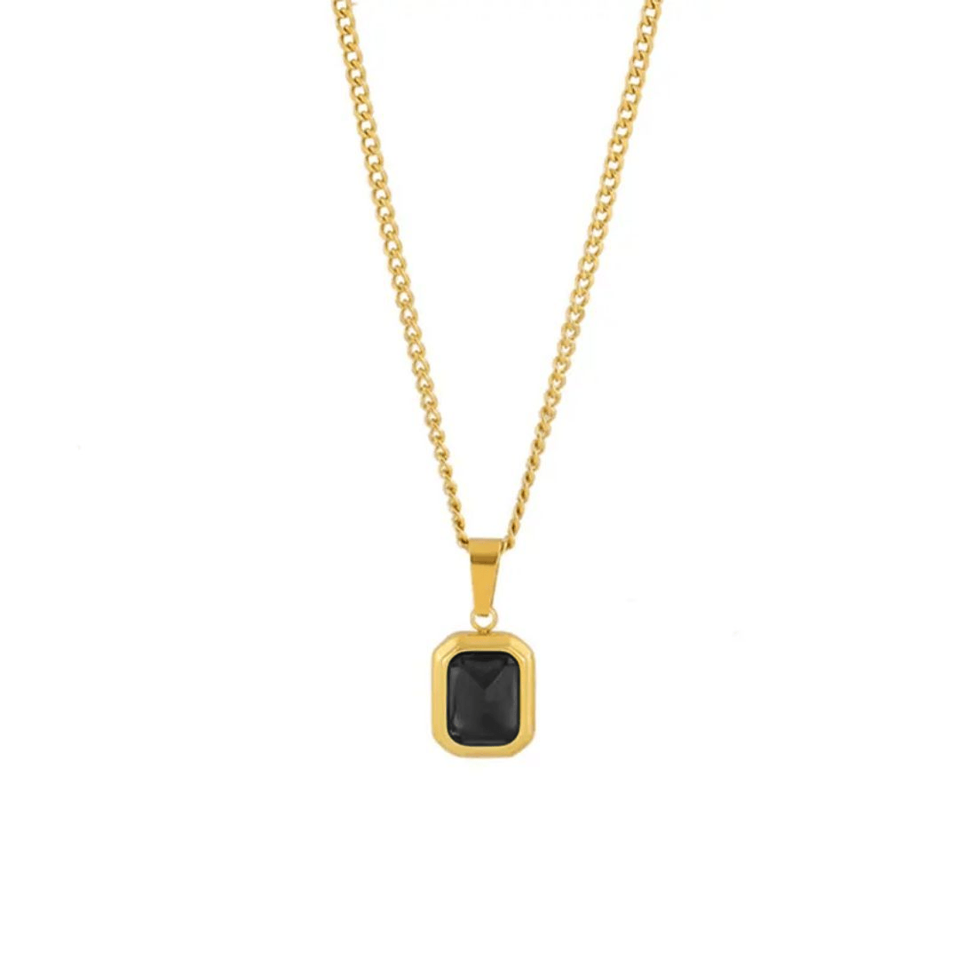 Ainna Official onyx charm pendant featuring a polished black onyx stone with a silver-tone metal setting.
