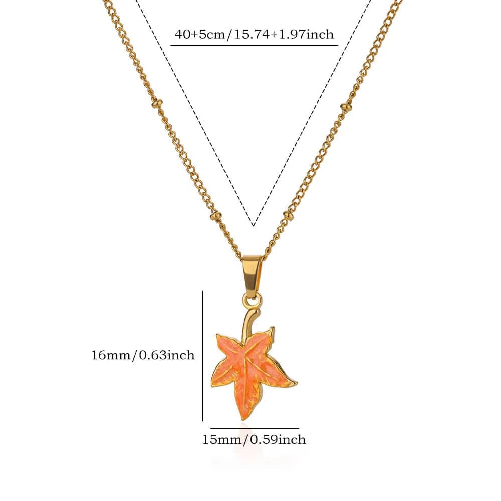 Ainna Official Amber Leaf Pendant hanging from a silver chain, showcasing a detailed amber leaf design on a neutral background.