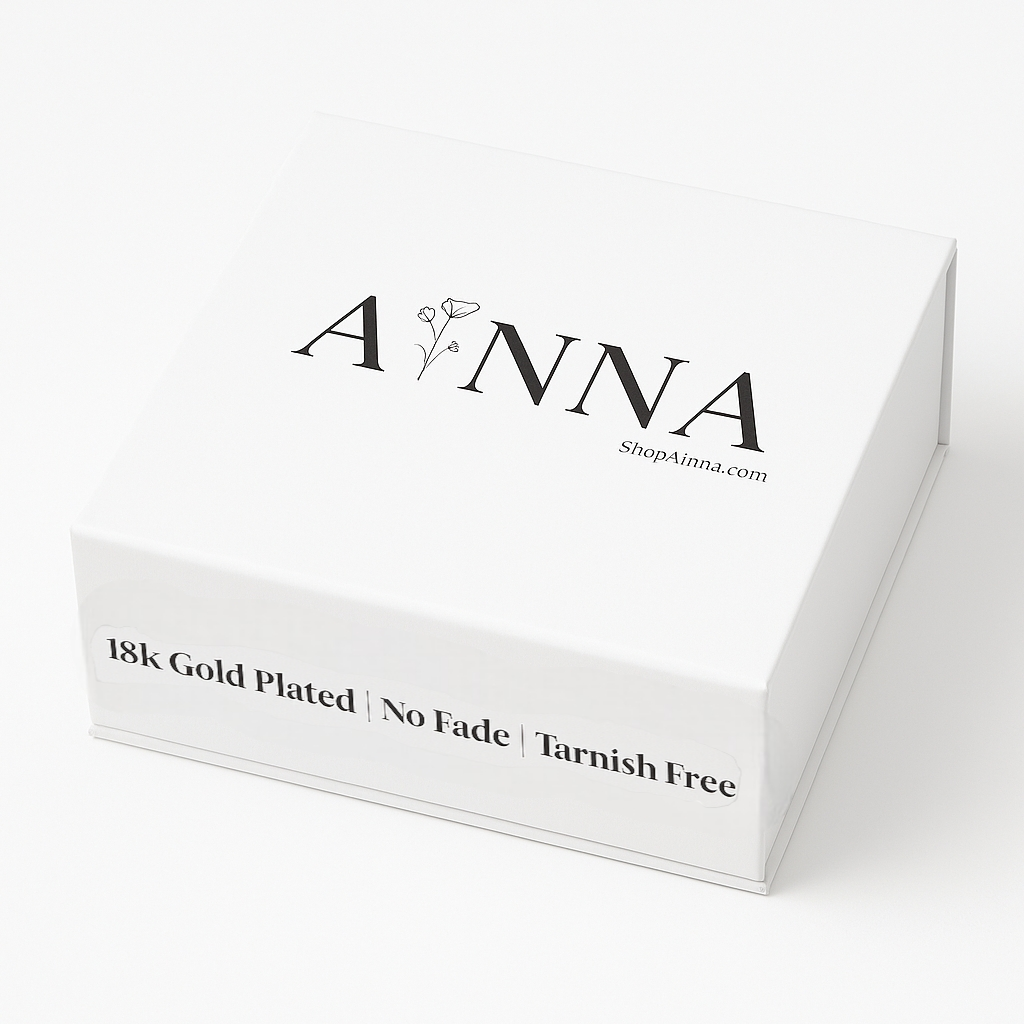 Ainna Official AINNA's Gift Box with assorted items arranged neatly, featuring elegant packaging and vibrant colors.