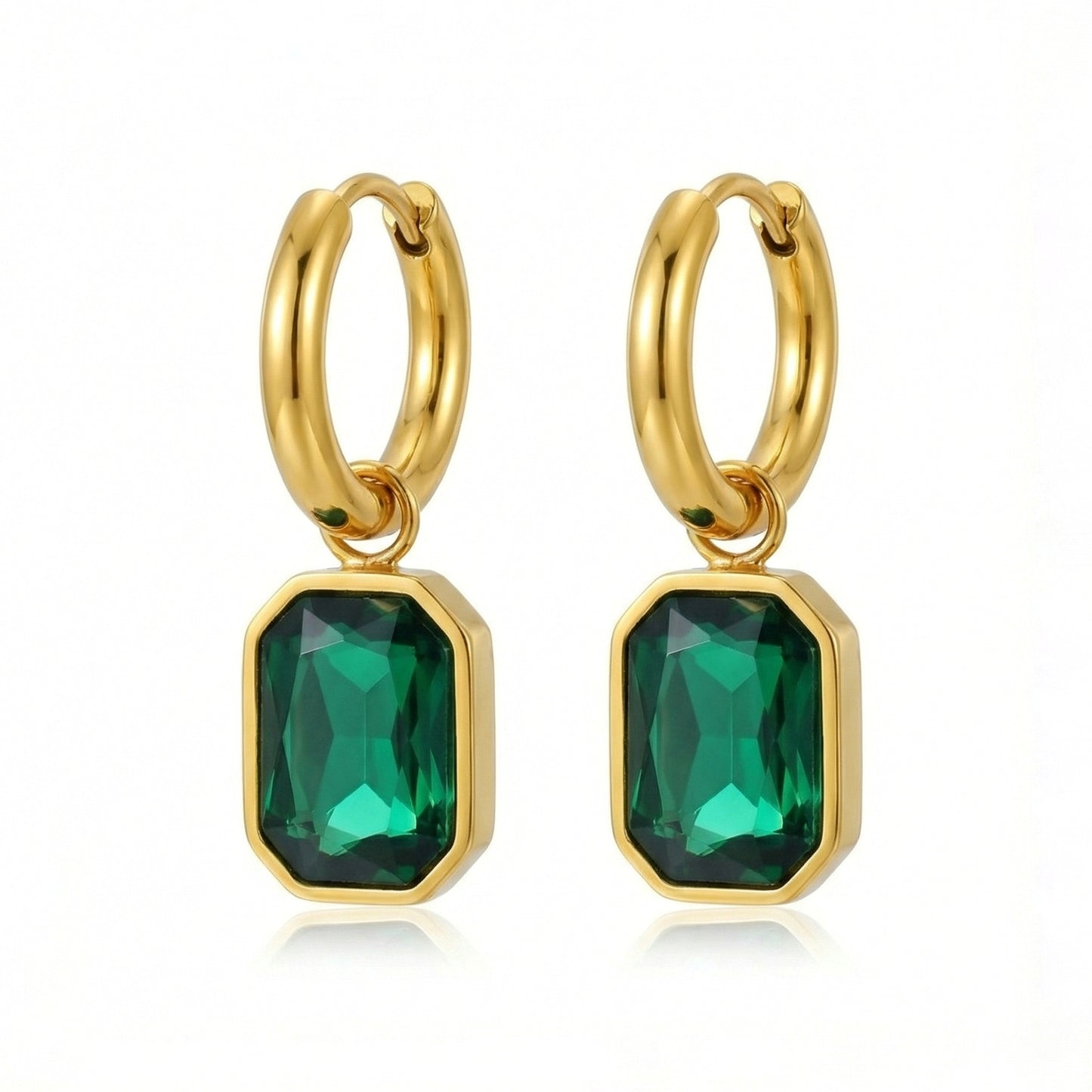 Emerald cut earrings with sparkling gemstones, stylish jewelry piece from My Store, close-up view of the elegant earrings.