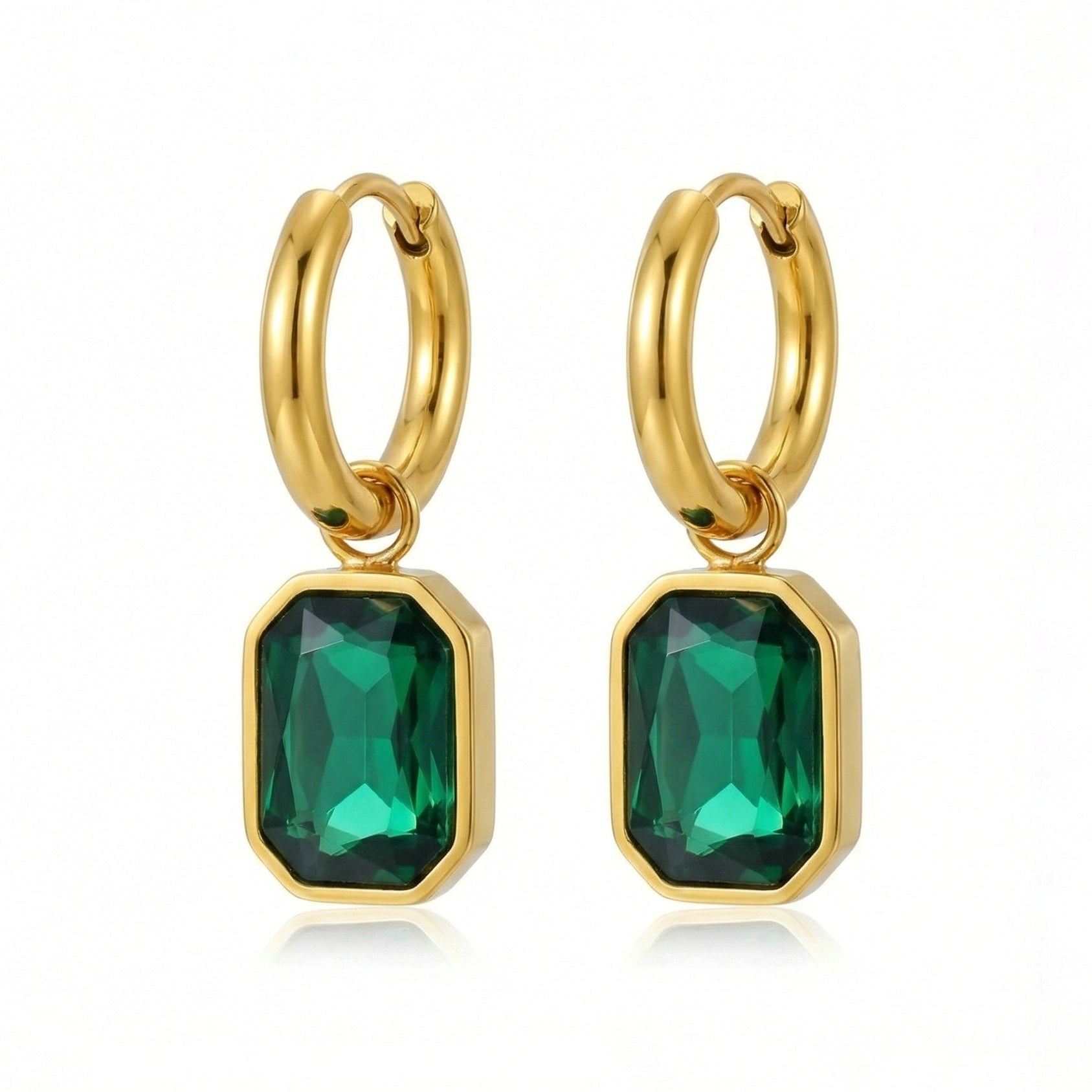Emerald cut earrings with sparkling gemstones, stylish jewelry piece from My Store, close-up view of the elegant earrings.
