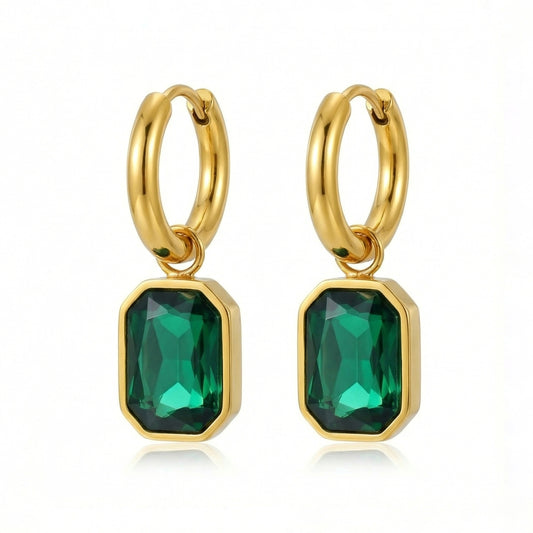Emerald cut earrings with sparkling gemstones, stylish jewelry piece from My Store, close-up view of the elegant earrings.