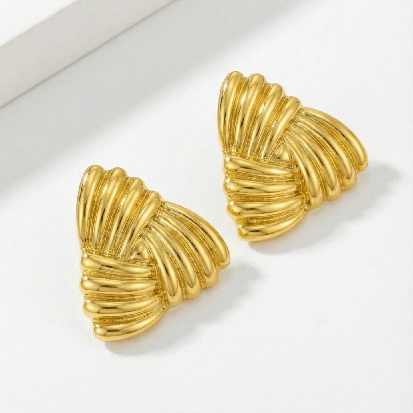 Golden shell studs
